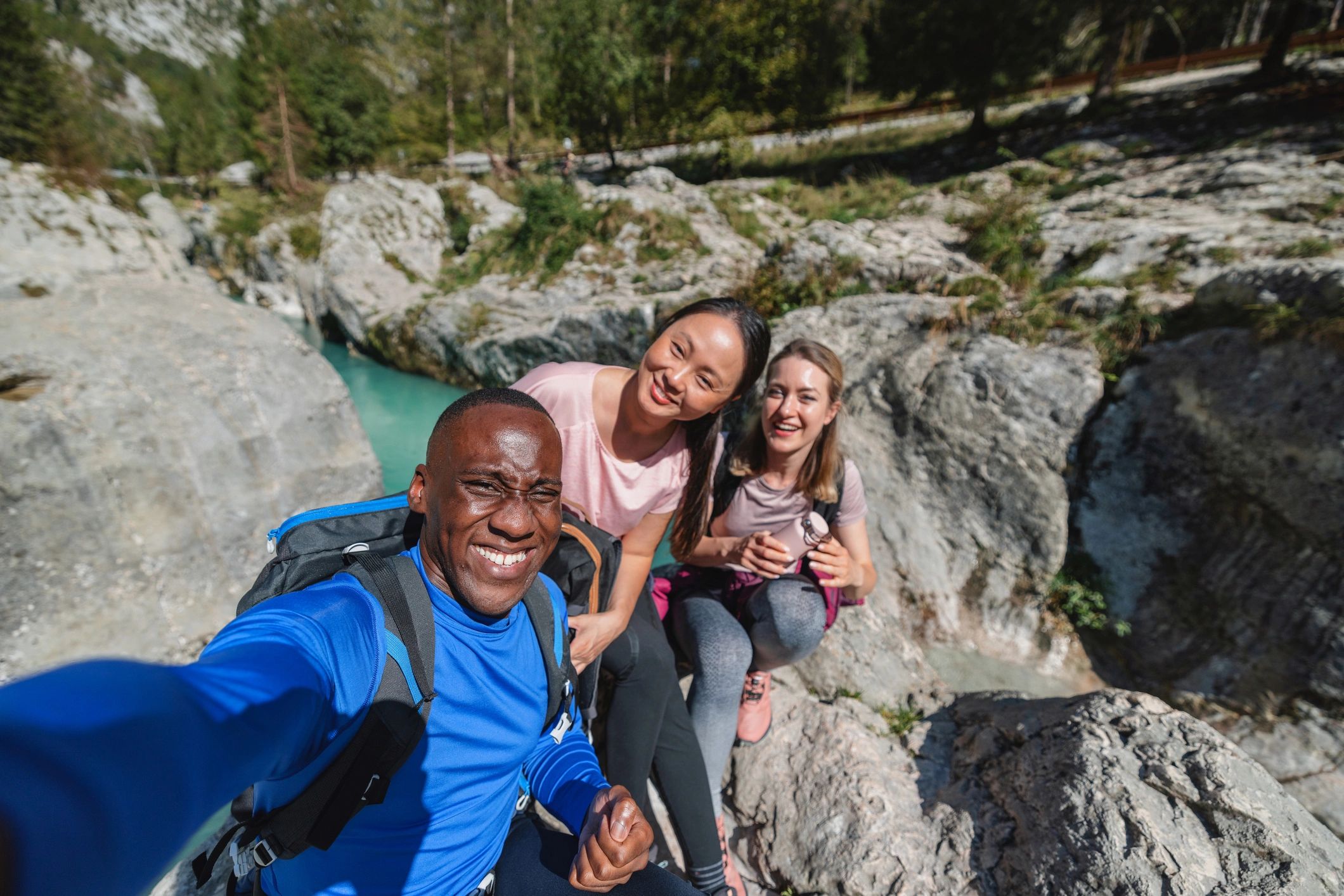Travelers enjoying a mountain viewpoint